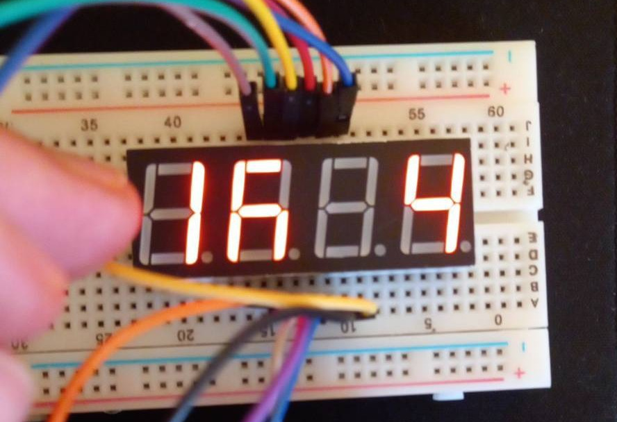 Output of first run.  Digits 1 and 4 are correct, digit 3 is not lit, and the bottom segment of digit 2 is not lit.